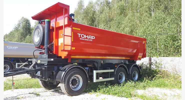 Полуприцеп-самосвал ТОНАР SP3-17 — общий боковой вид красного самосвального прицепа